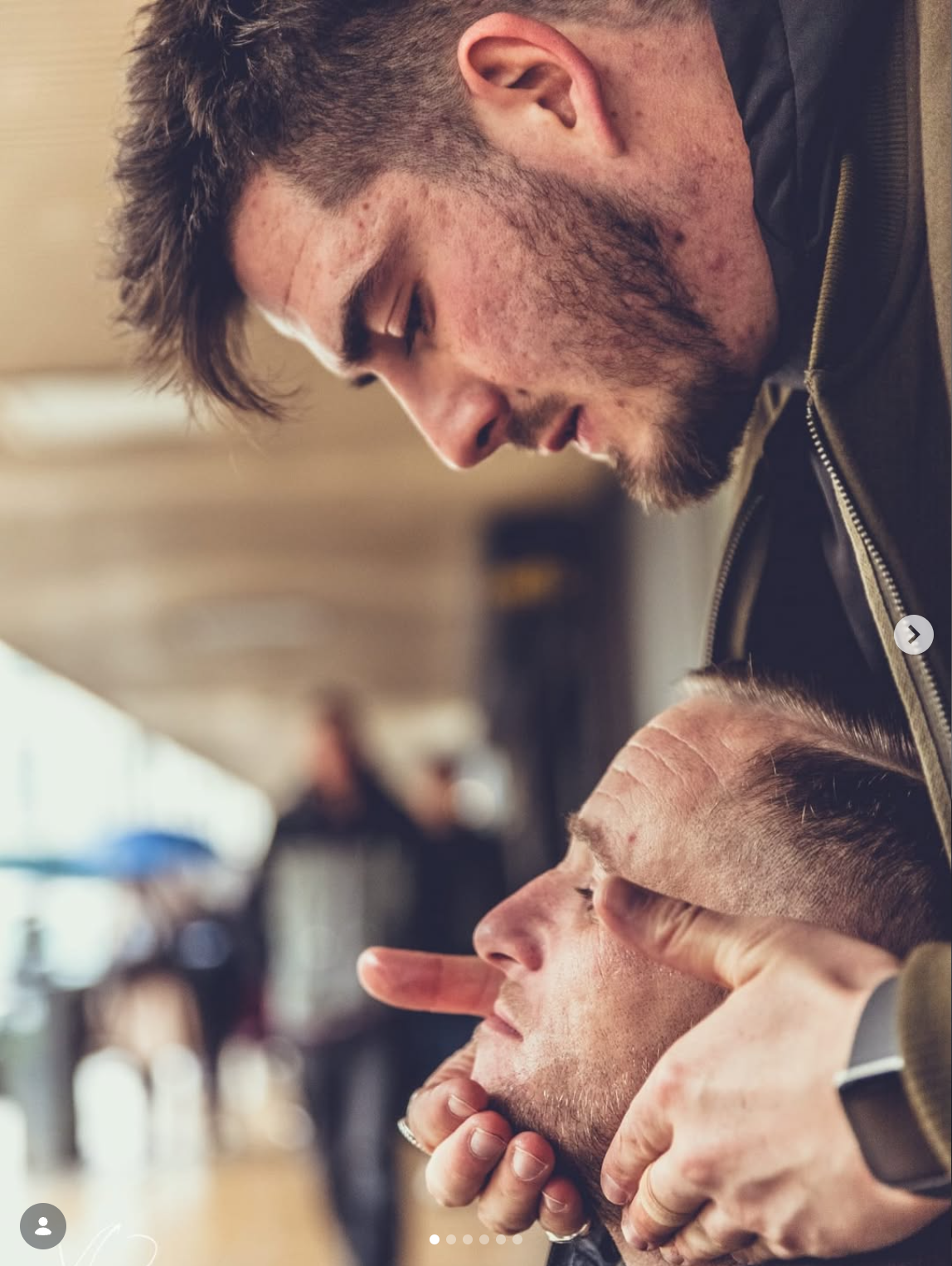 Eddie giving a haircut on the street